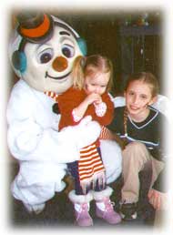 Children with Snow Man at Holiday Mountain